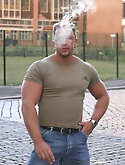 Musclehunk Aaron Giant smoking in the Mercedes